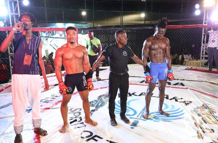 Nigeria's Yahaya Yahuza defeats Christopher Moly of DR Congo by submission due to a rear naked choke to emerge winner of the -84kg weight class during a Mixed Martial Arts (MMA) fight night in Abuja on Saturday