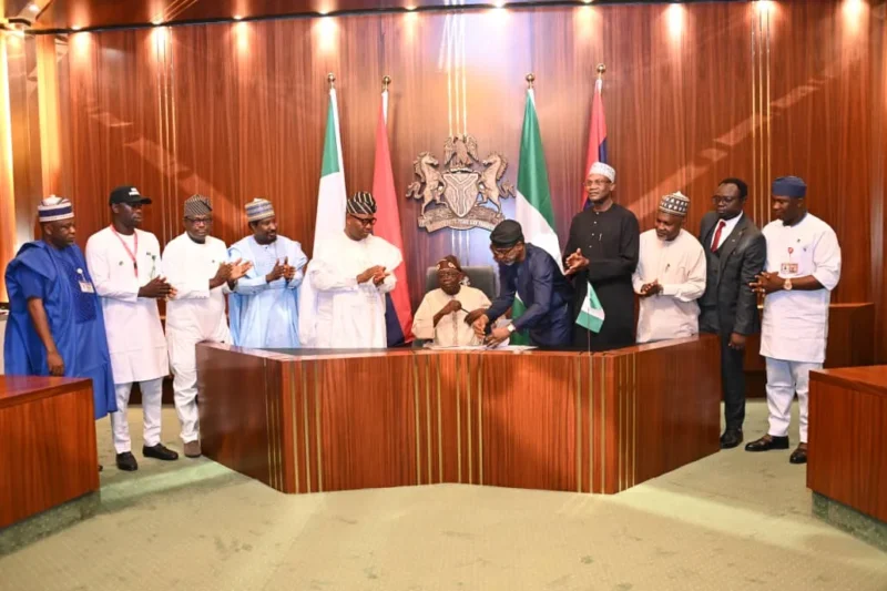 President Tinubu while signing the Students Loan Bill into law in Abuja on Wednesday