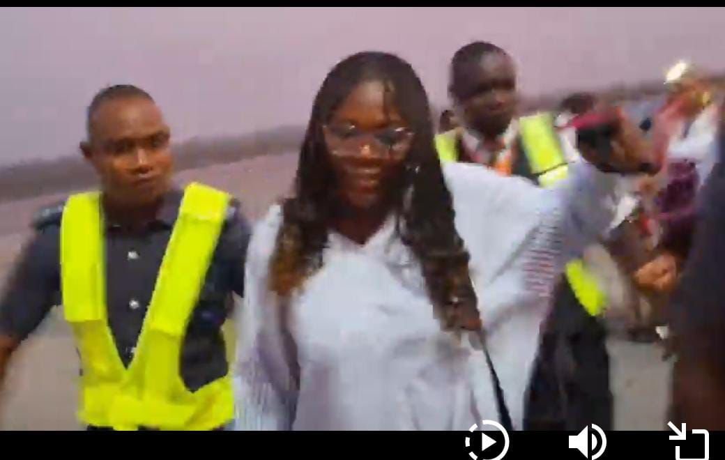 Unruly Ibom Air passenger, being ecsorted off the plane