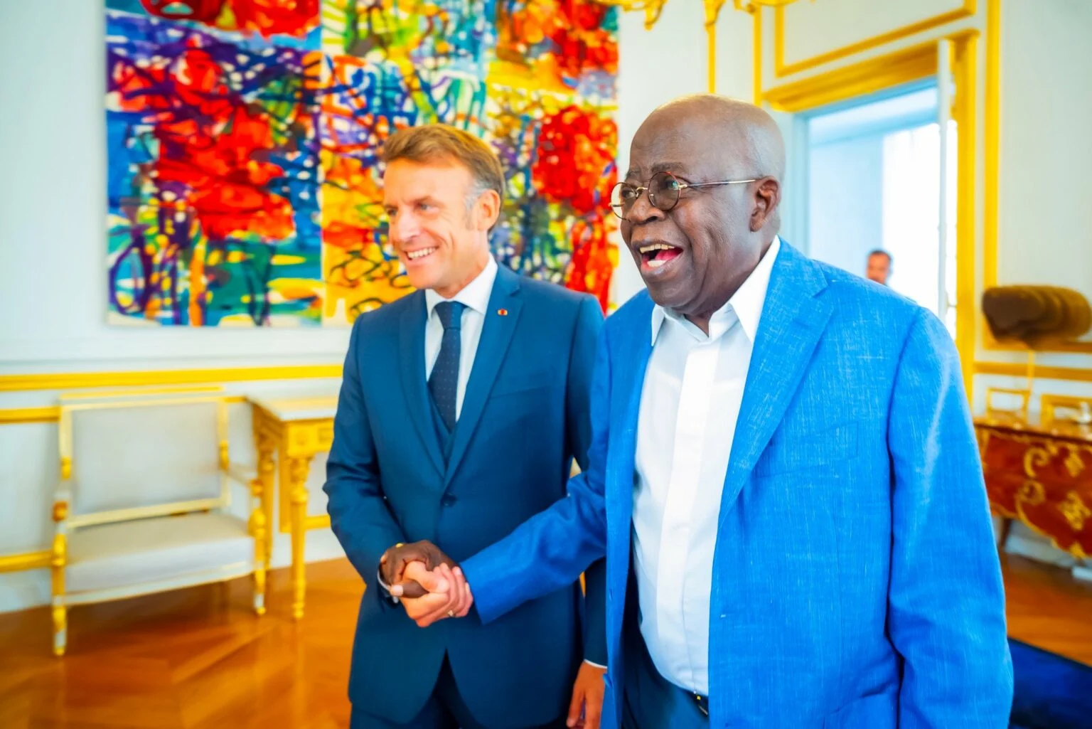 Tinubu-in-a-warm-exchange-with-Macron-at-the-Elysee-Palace-in-Paris.